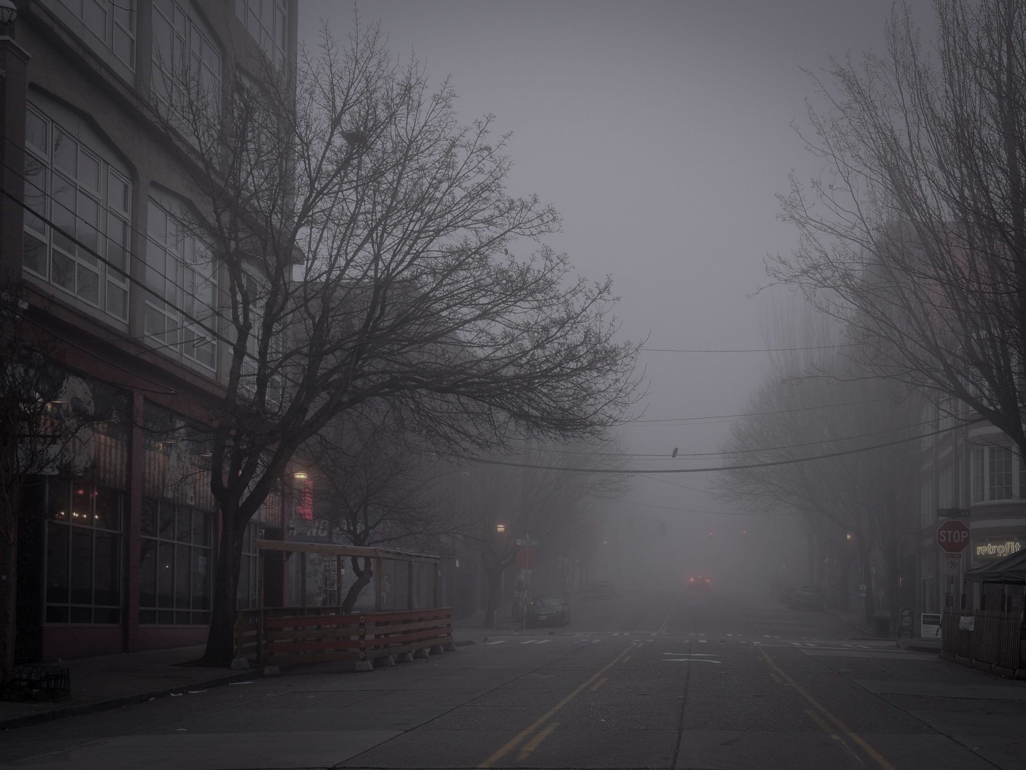 Empty streets clouded in fog