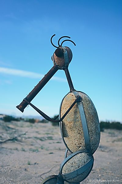 Glass Outhouse Art Gallery Kokopelli Sculpture