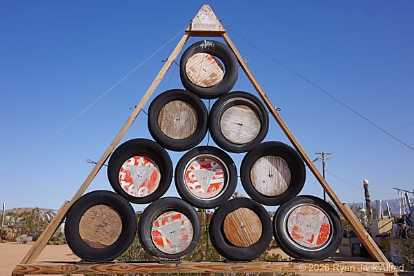 Noah Purifoy Triangle Tires Sculpture
